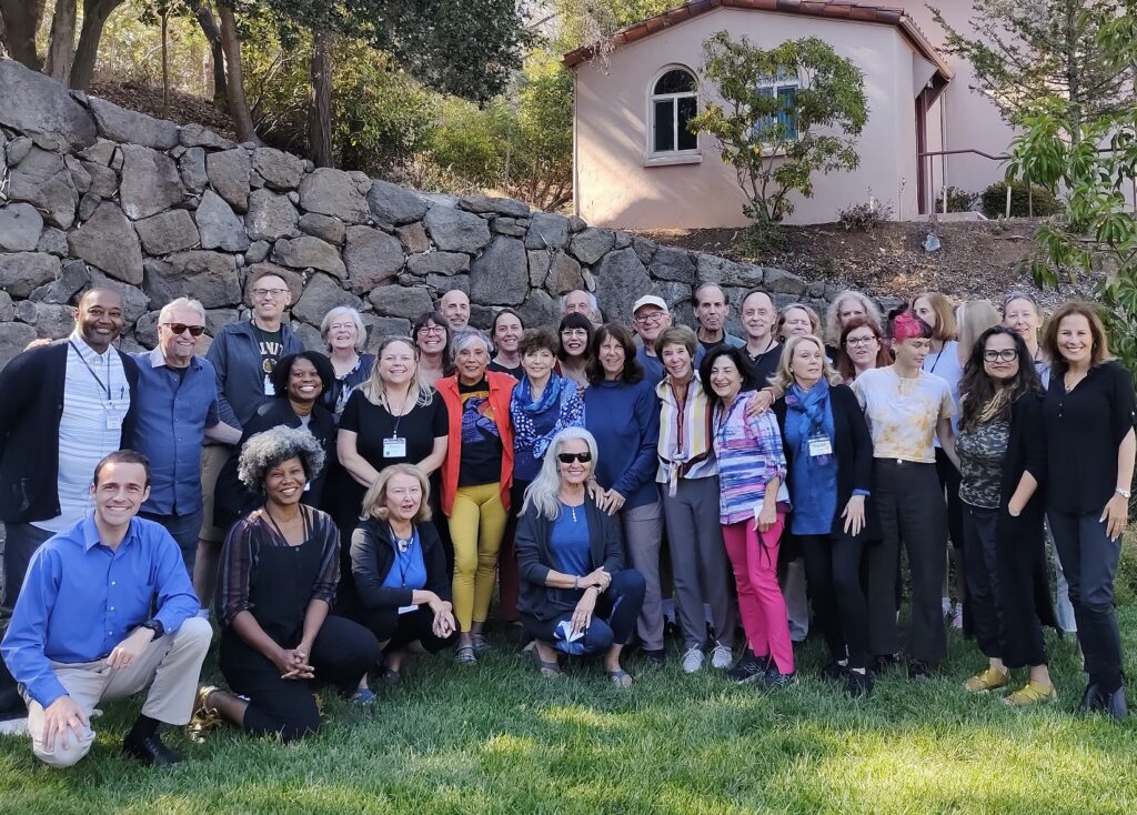 Attendees at the 2022 BK Retreat pose for a picture outdoors.